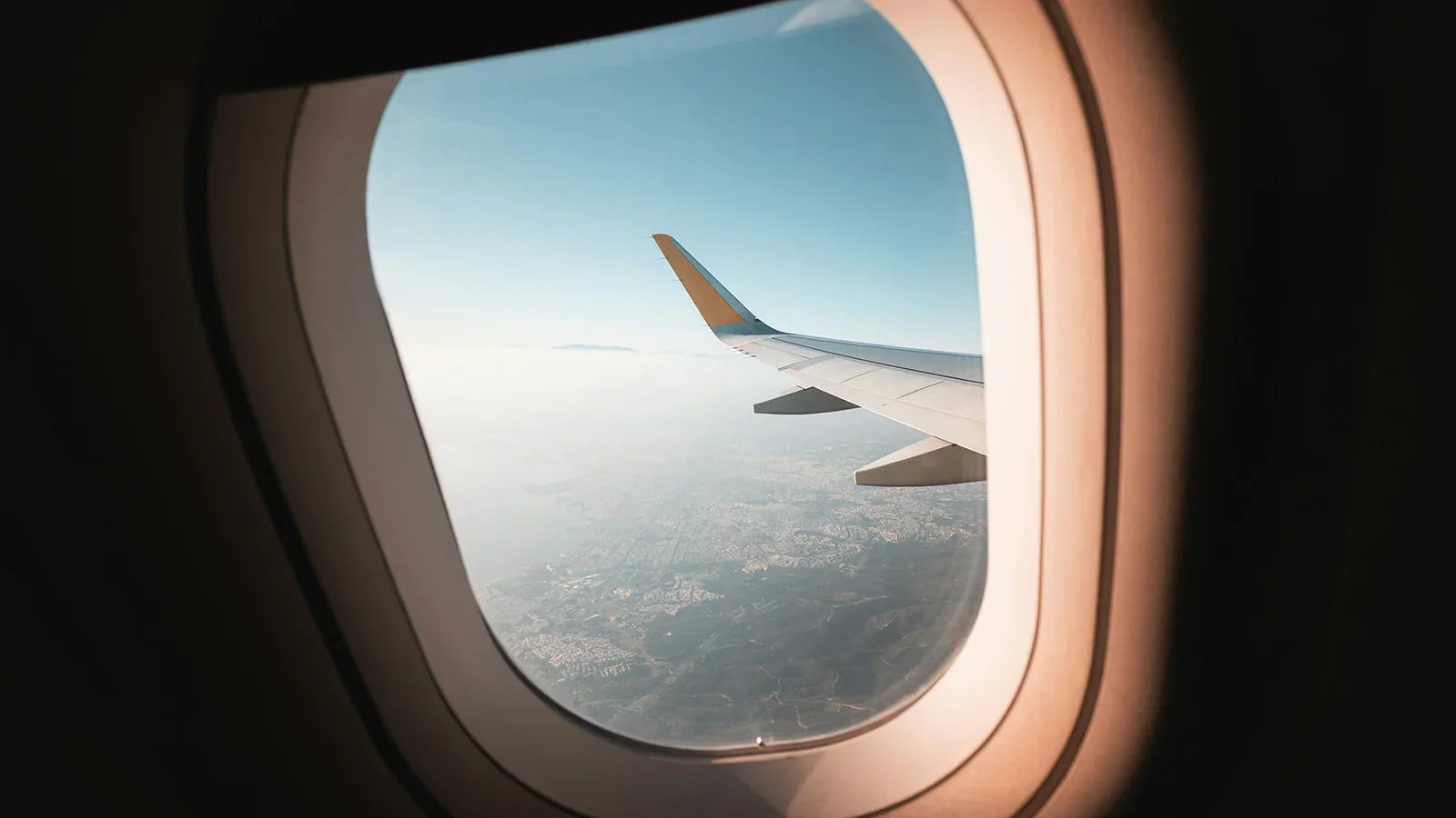 View through an airplane window in flight